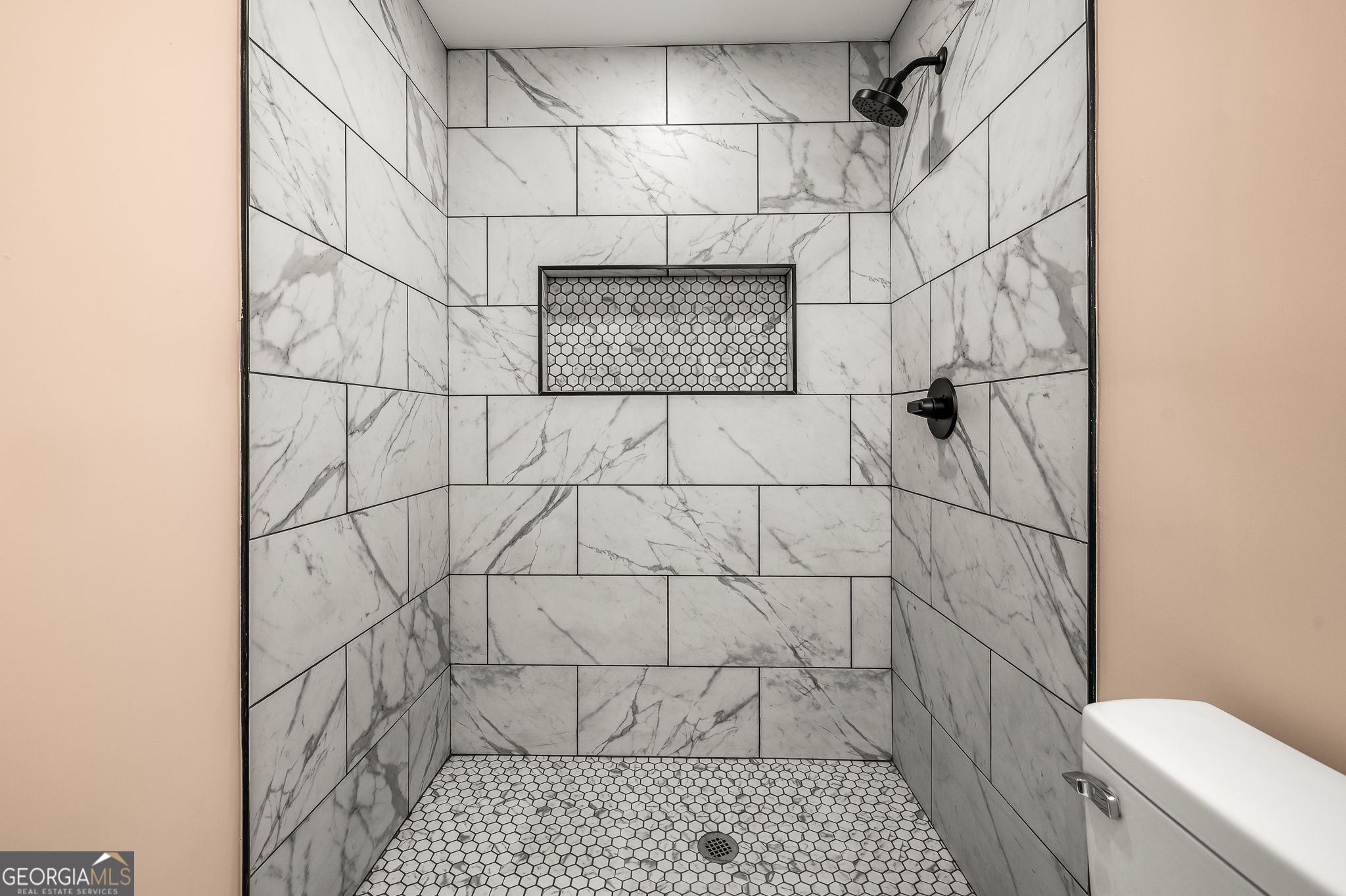 596 Watson Street Toccoa, GA 30577 - Photo 14 of 25 a bathroom with a shower