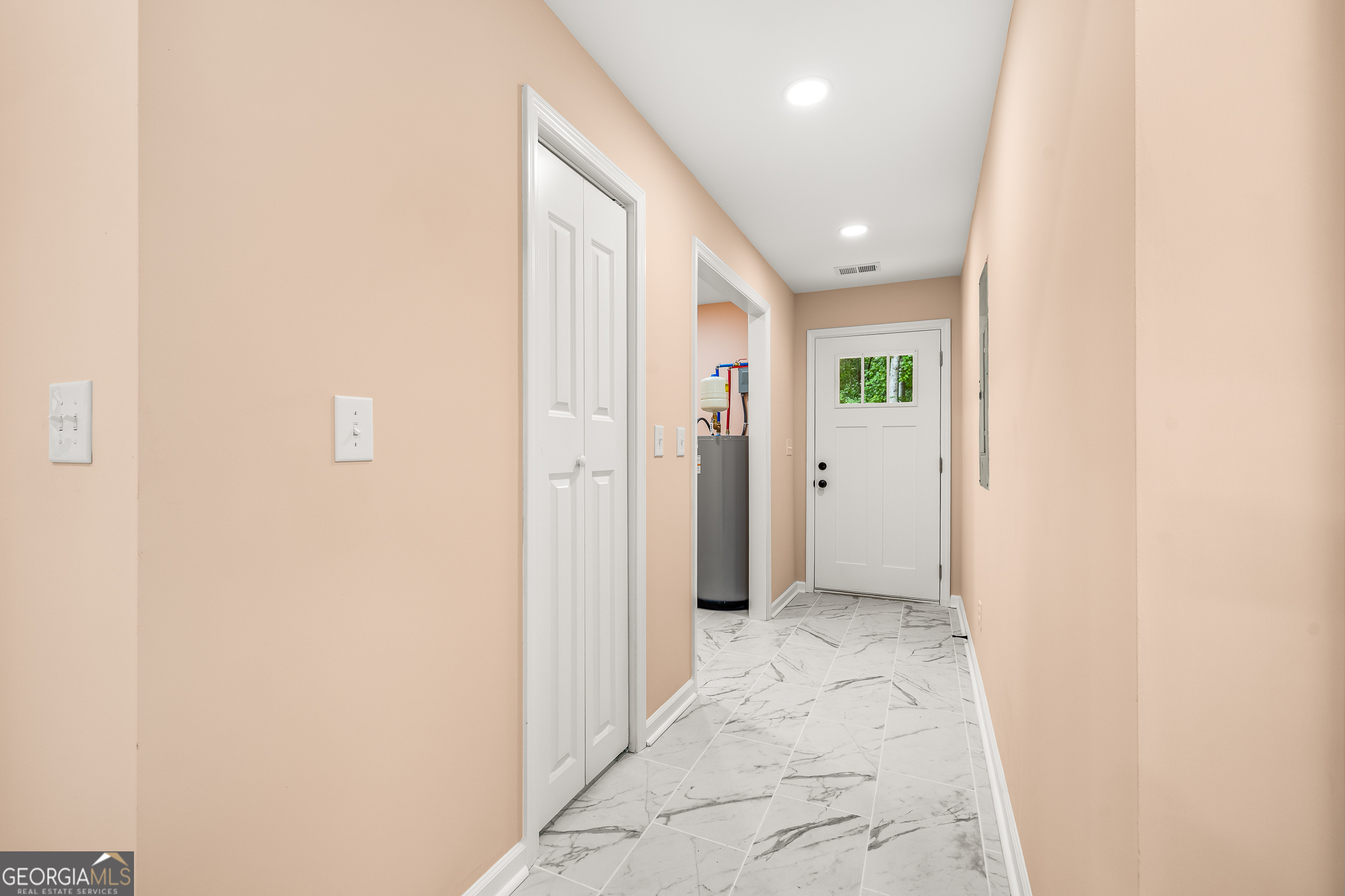 596 Watson Street Toccoa, GA 30577 - Photo 16 of 25 view of a hallway with wooden shelves
