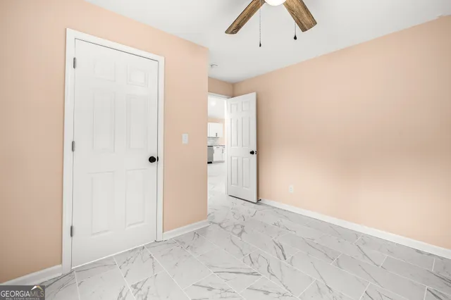 a bathroom with a sink a toilet and a bathtub