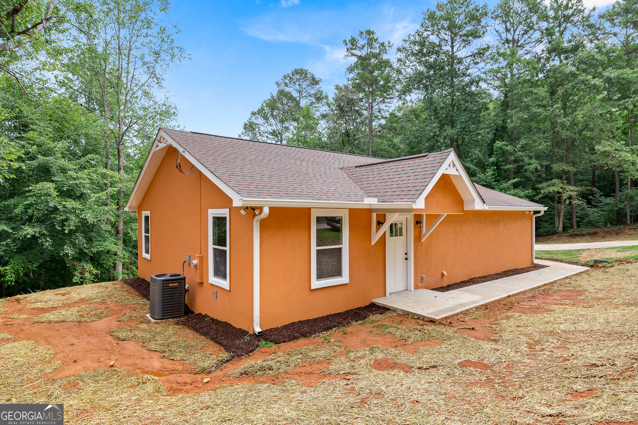 596 Watson Street Toccoa, GA 30577 - Photo 24 of 25 a view of a house with backyard and trees