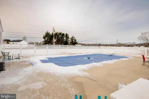 a view of outdoor space with yard and ocean view