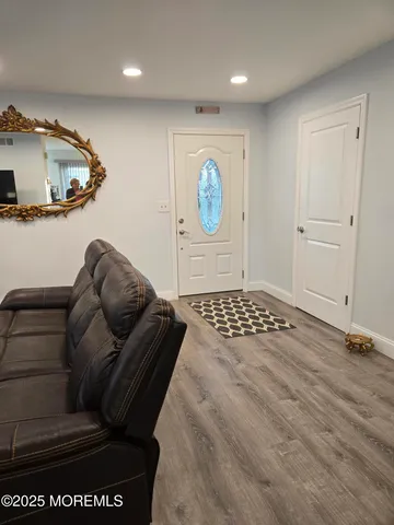 a living room with furniture and a table