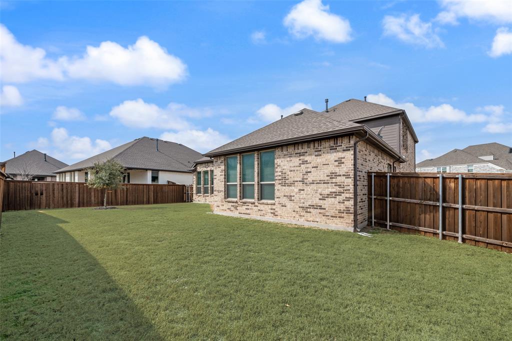 1712 Birch Street Mansfield, TX 76063 - Photo 30 of 35 a front view of a house with a yard