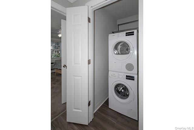 113 Terrace, Unit T01113 Bayport, NY 11705 - Photo 8 of 13 a utility room with dryer and washer