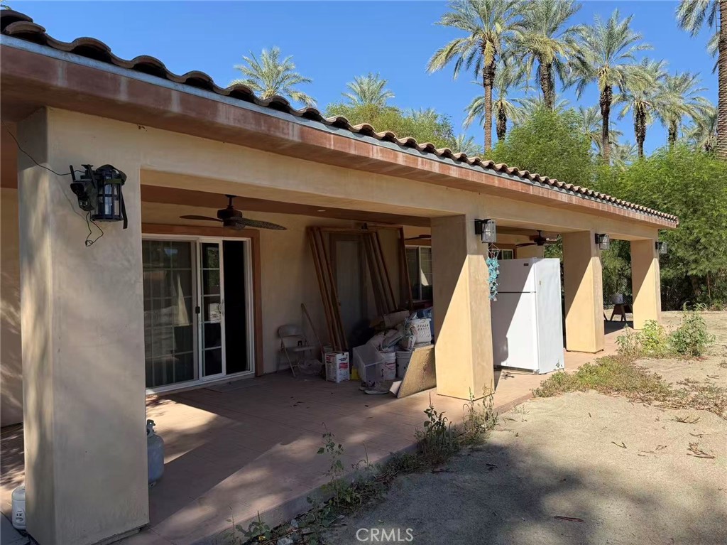66820 Harrison Street Thermal, CA 92274 - Photo 3 of 11 a view of a house with a patio