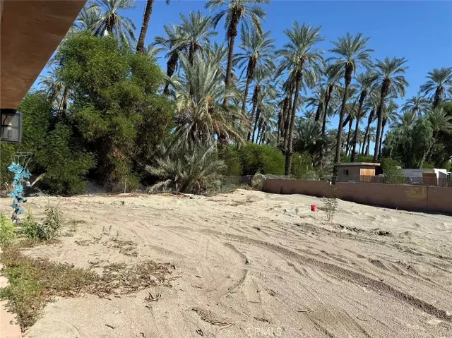 a view of a backyard of the house