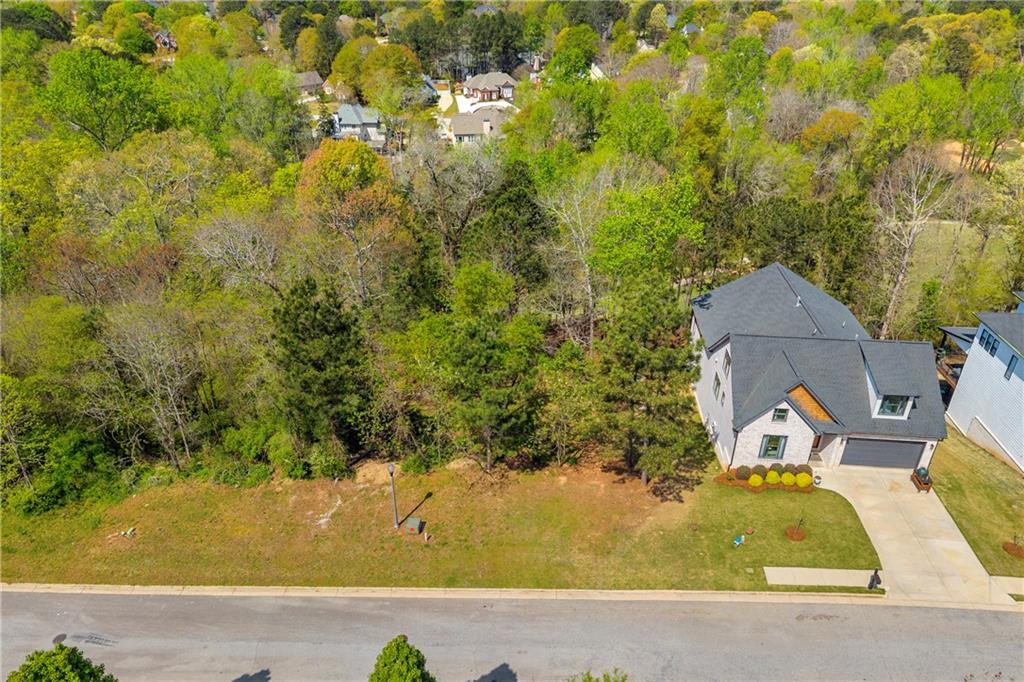 9153 Golfview Lane Covington, GA 30014 - Photo 5 of 10 an aerial view of a house with swimming pool