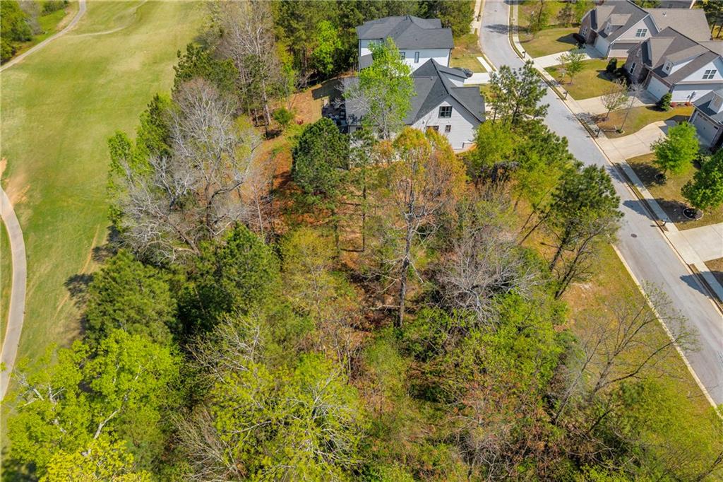 9153 Golfview Lane Covington, GA 30014 - Photo 8 of 10 a aerial view of residential houses with yard
