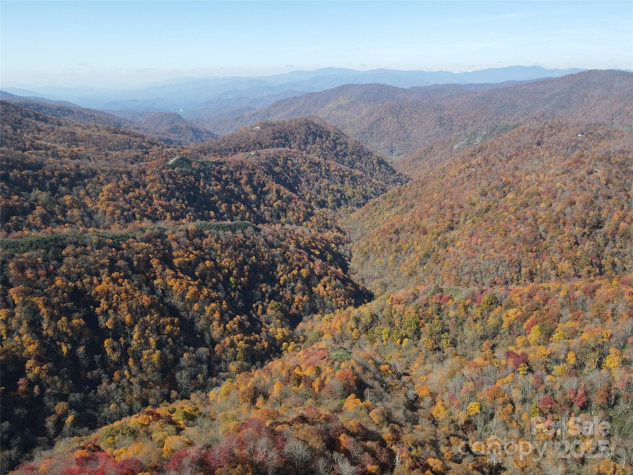 3837-3689 Plott Balsam Road Maggie Valley, NC 28751 - Photo 26 of 36 a view of a city with mountains in the background