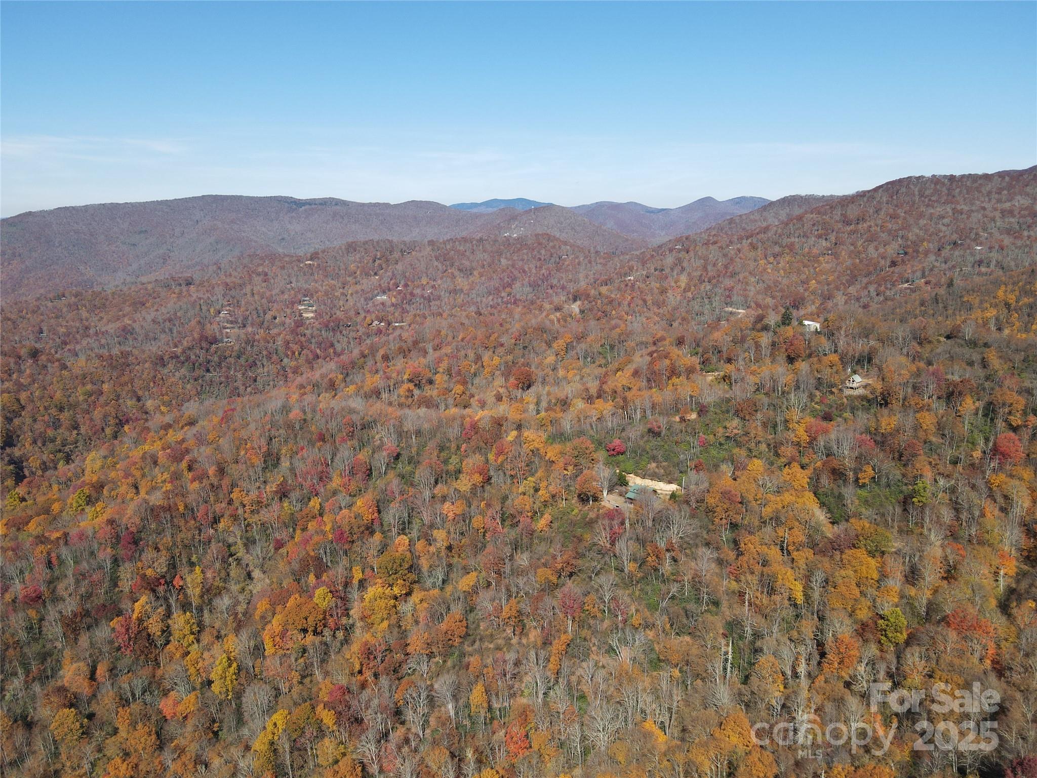 3837-3689 Plott Balsam Road Maggie Valley, NC 28751 - Photo 29 of 36 a view of a mountain range with lush green forest