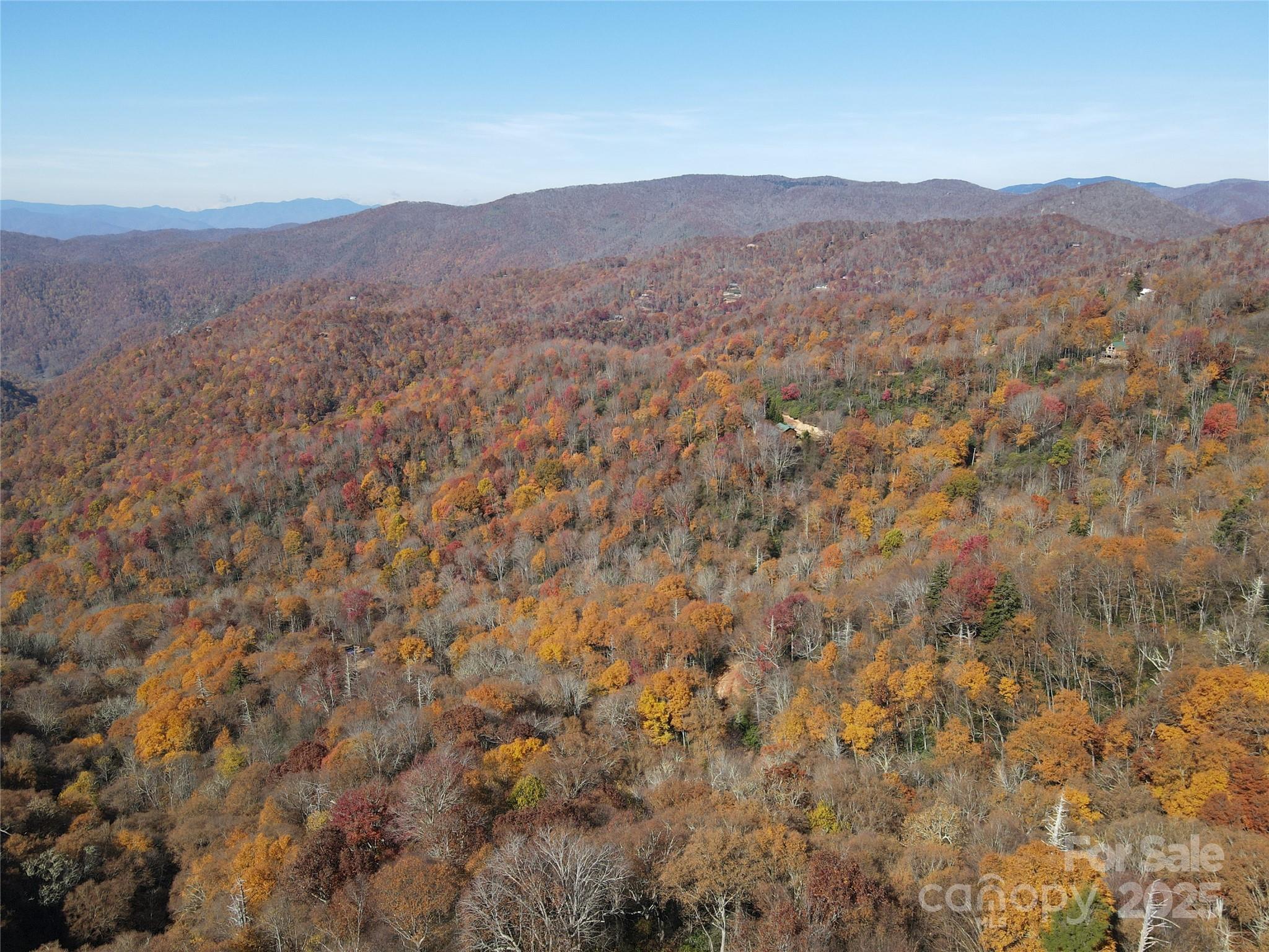 3837-3689 Plott Balsam Road Maggie Valley, NC 28751 - Photo 31 of 36 a view of a mountain range in a cloudy sky