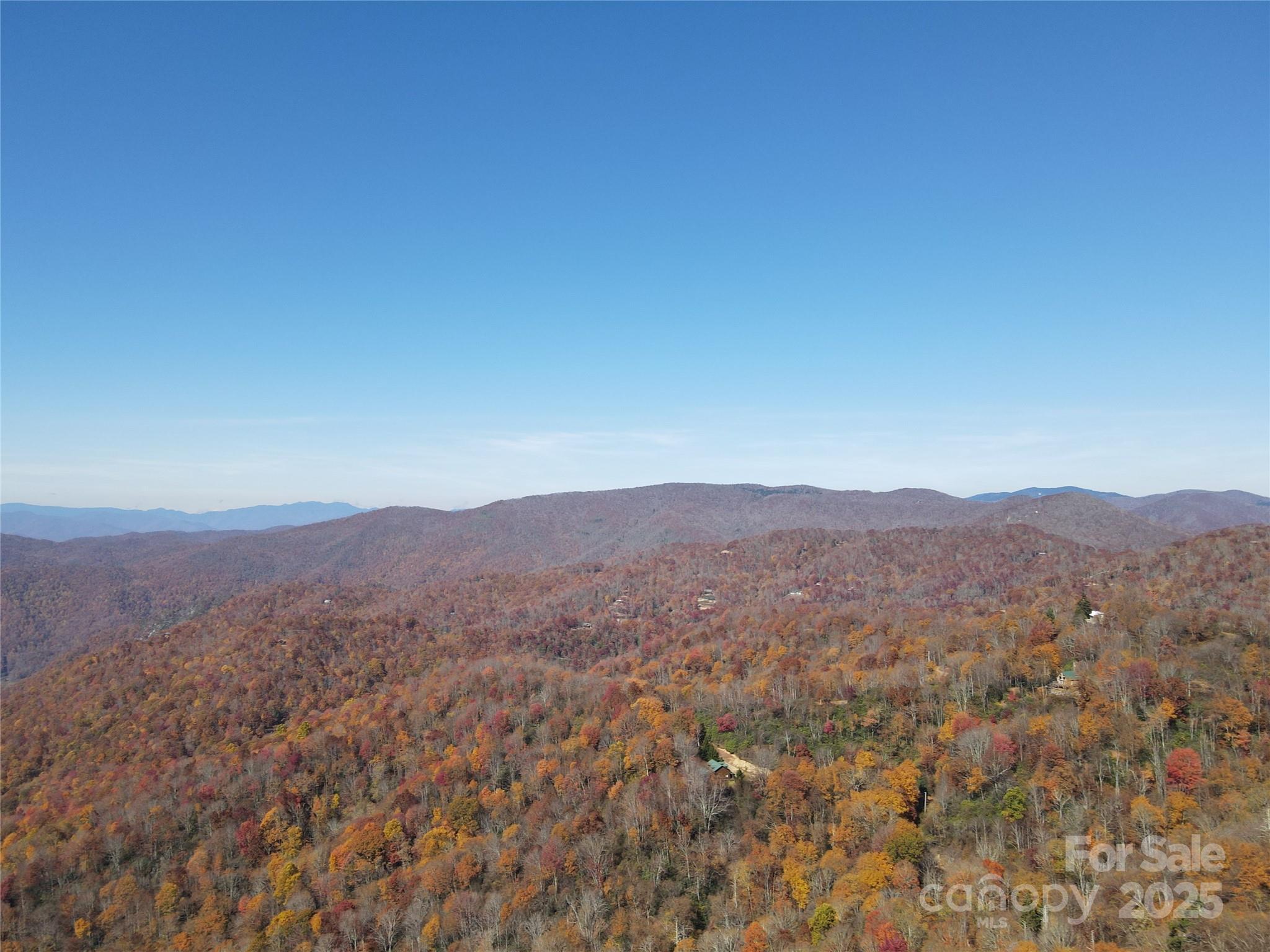 3837-3689 Plott Balsam Road Maggie Valley, NC 28751 - Photo 7 of 36 a view of a mountain range with lush green forest