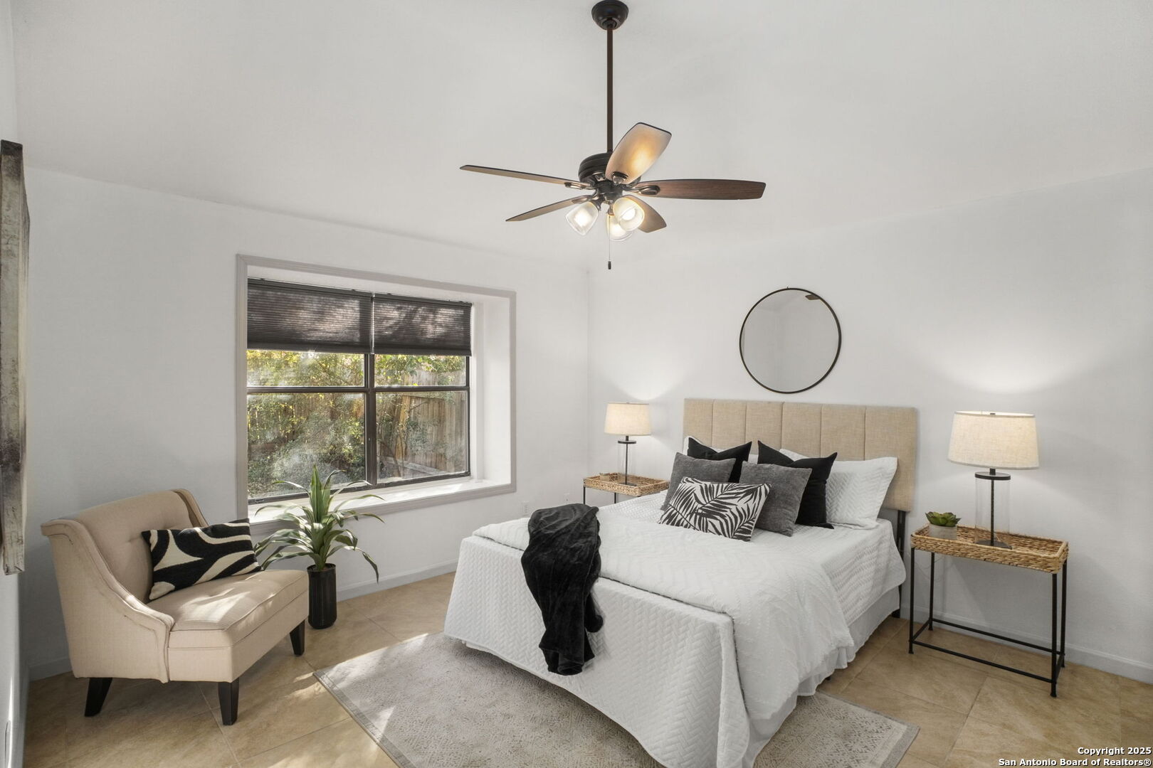 7562 Beaver Tree San Antonio, TX 78249 - Photo 16 of 30 a bedroom with a bed and window