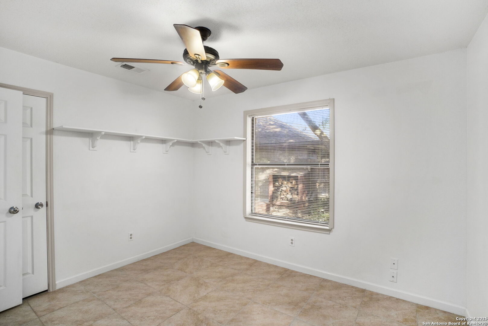 7562 Beaver Tree San Antonio, TX 78249 - Photo 21 of 30 a view of an empty room with a window