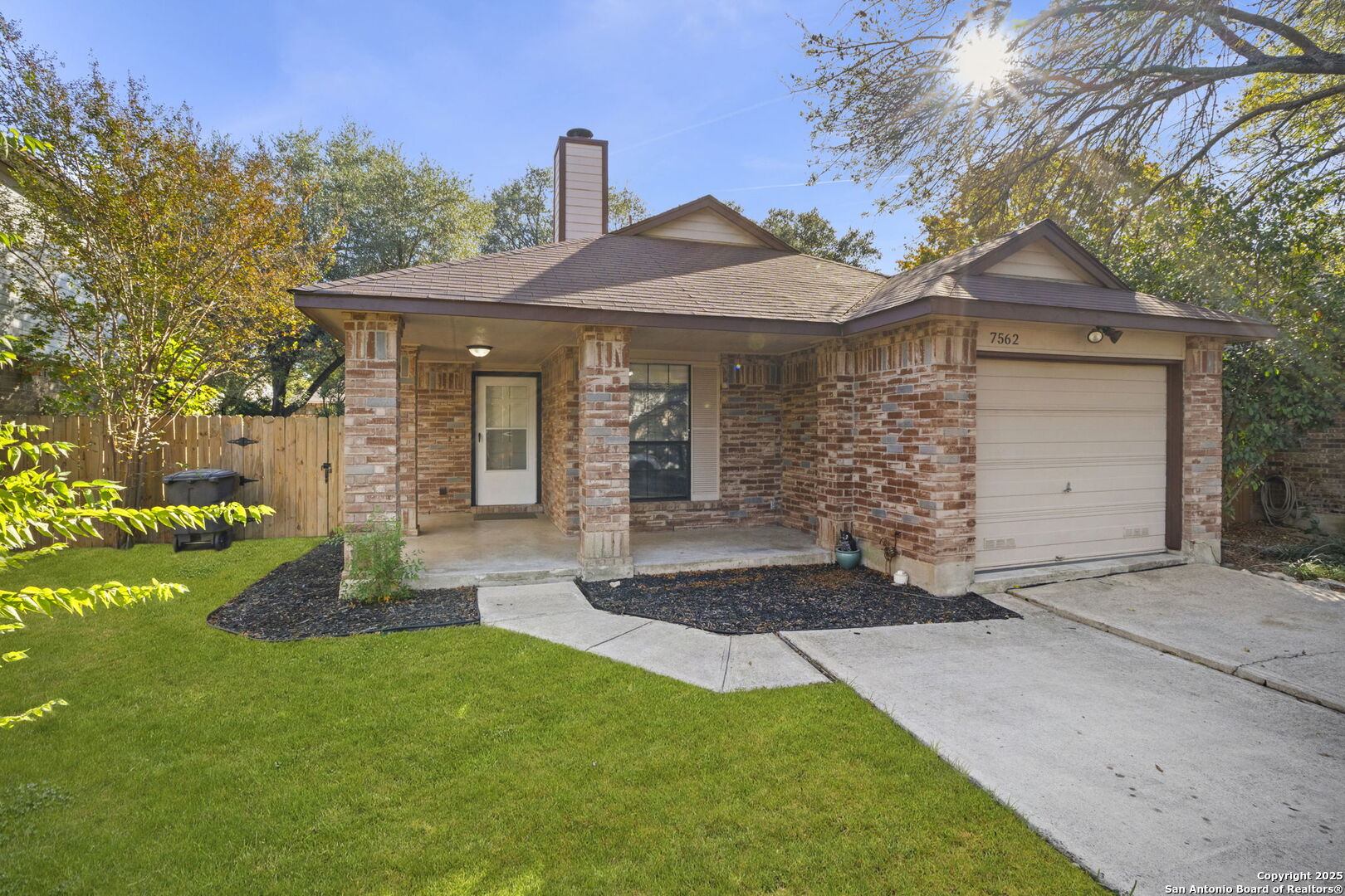 7562 Beaver Tree San Antonio, TX 78249 - Photo 3 of 30 a front view of a house with garden