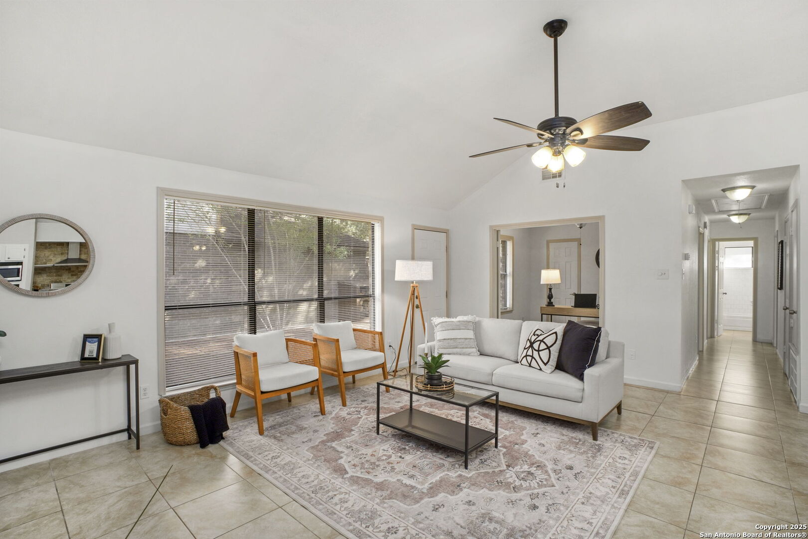 7562 Beaver Tree San Antonio, TX 78249 - Photo 6 of 30 a living room with furniture and a chandelier