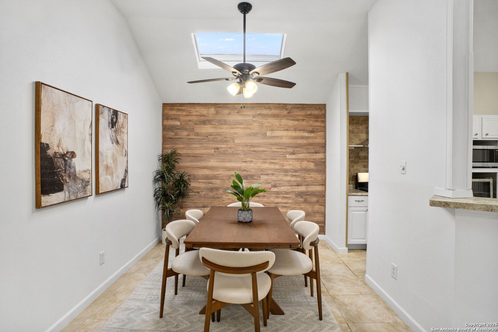 7562 Beaver Tree San Antonio, TX 78249 - Photo 9 of 30 a view of a dining room with furniture window and wooden floor