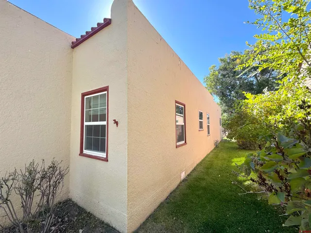 a view of backyard of a house