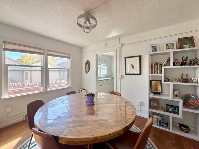 a view of a dining room with furniture