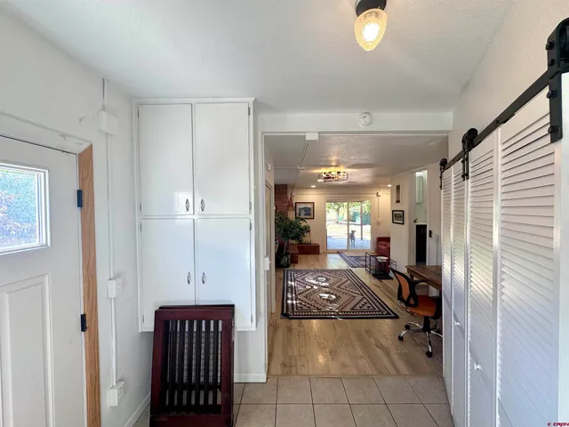 a view of an entryway with a livingroom