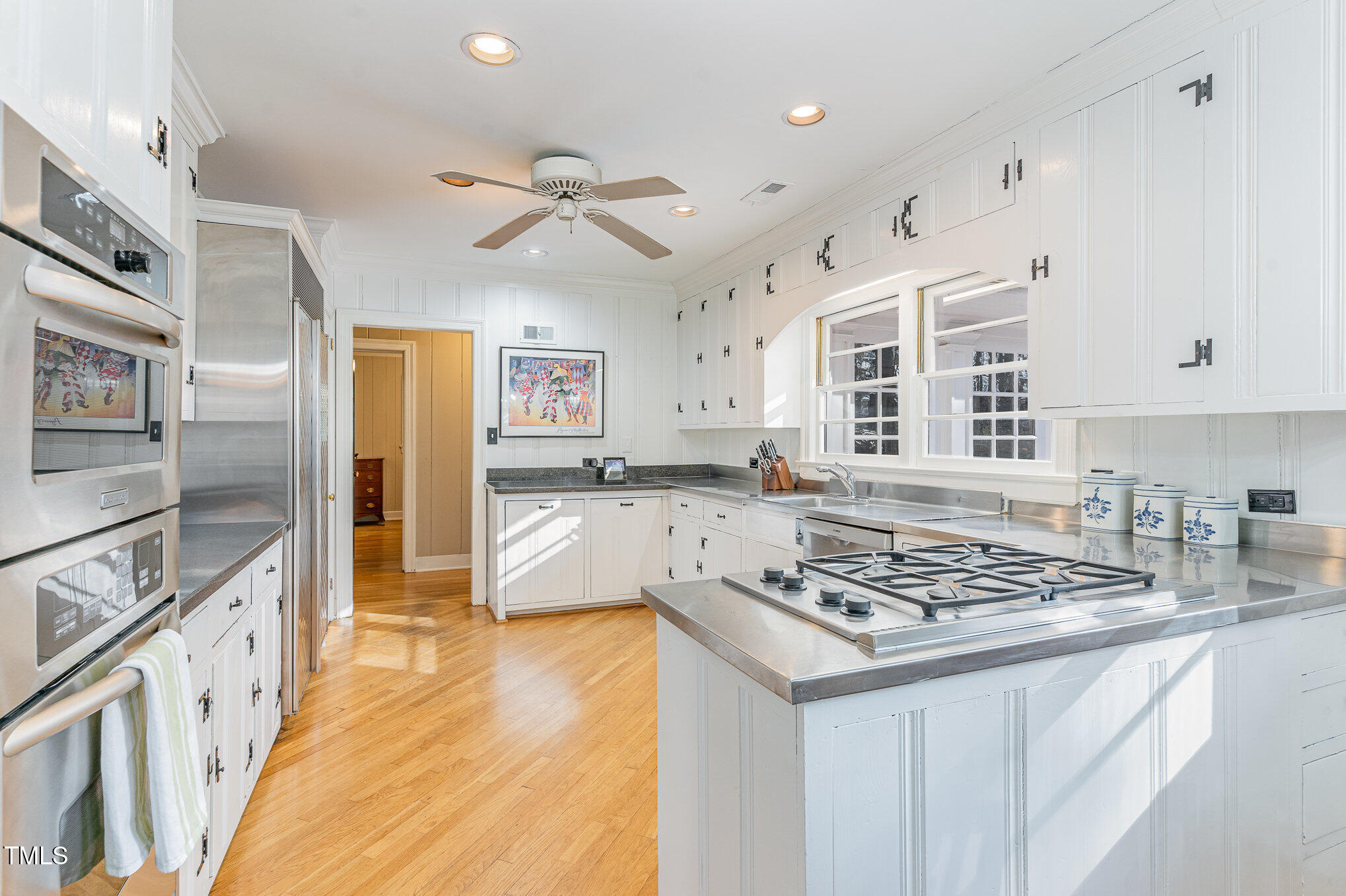 2801 Chelsea Circle Durham, NC 27707 - Photo 10 of 41 a kitchen with stainless steel appliances granite countertop a sink stove and refrigerator