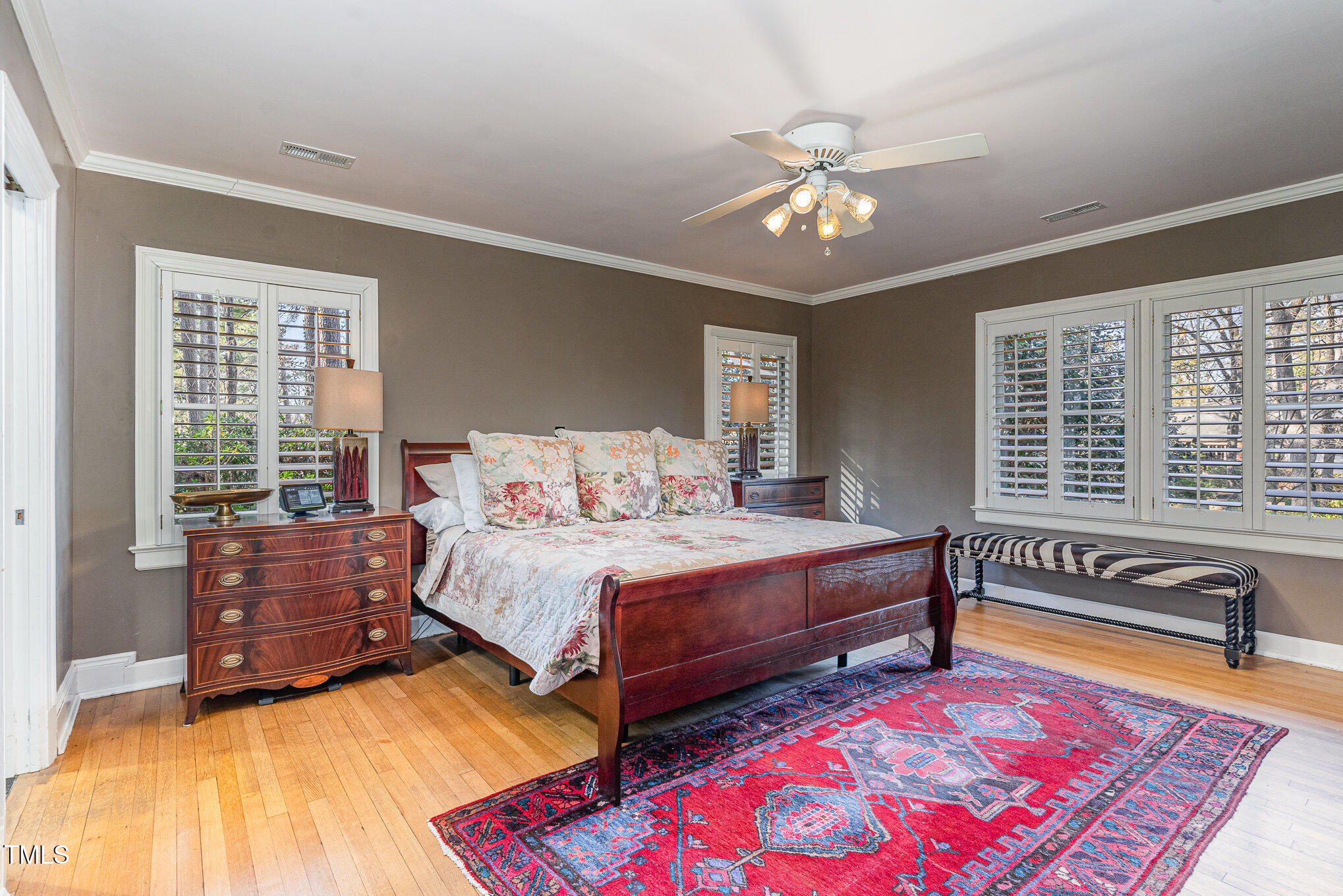 2801 Chelsea Circle Durham, NC 27707 - Photo 15 of 41 a bedroom with a bed and a chandelier