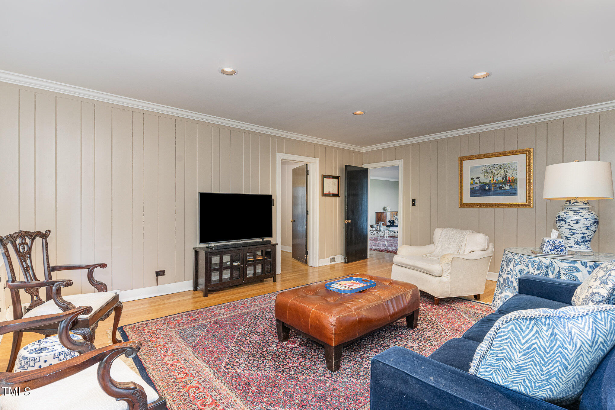 2801 Chelsea Circle Durham, NC 27707 - Photo 20 of 41 a living room with furniture and a flat screen tv