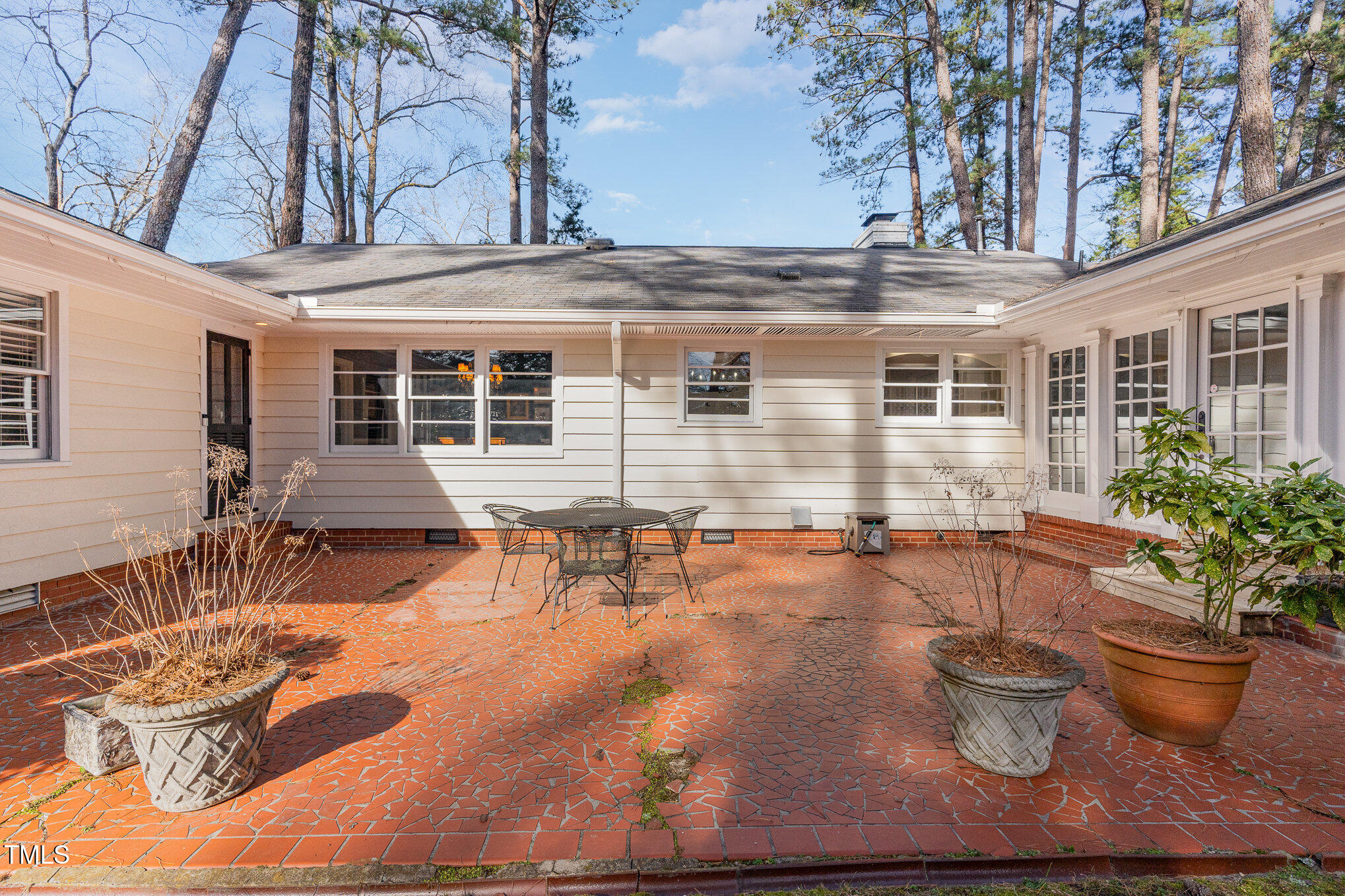 2801 Chelsea Circle Durham, NC 27707 - Photo 31 of 41 a view of a patio with chairs and potted plants