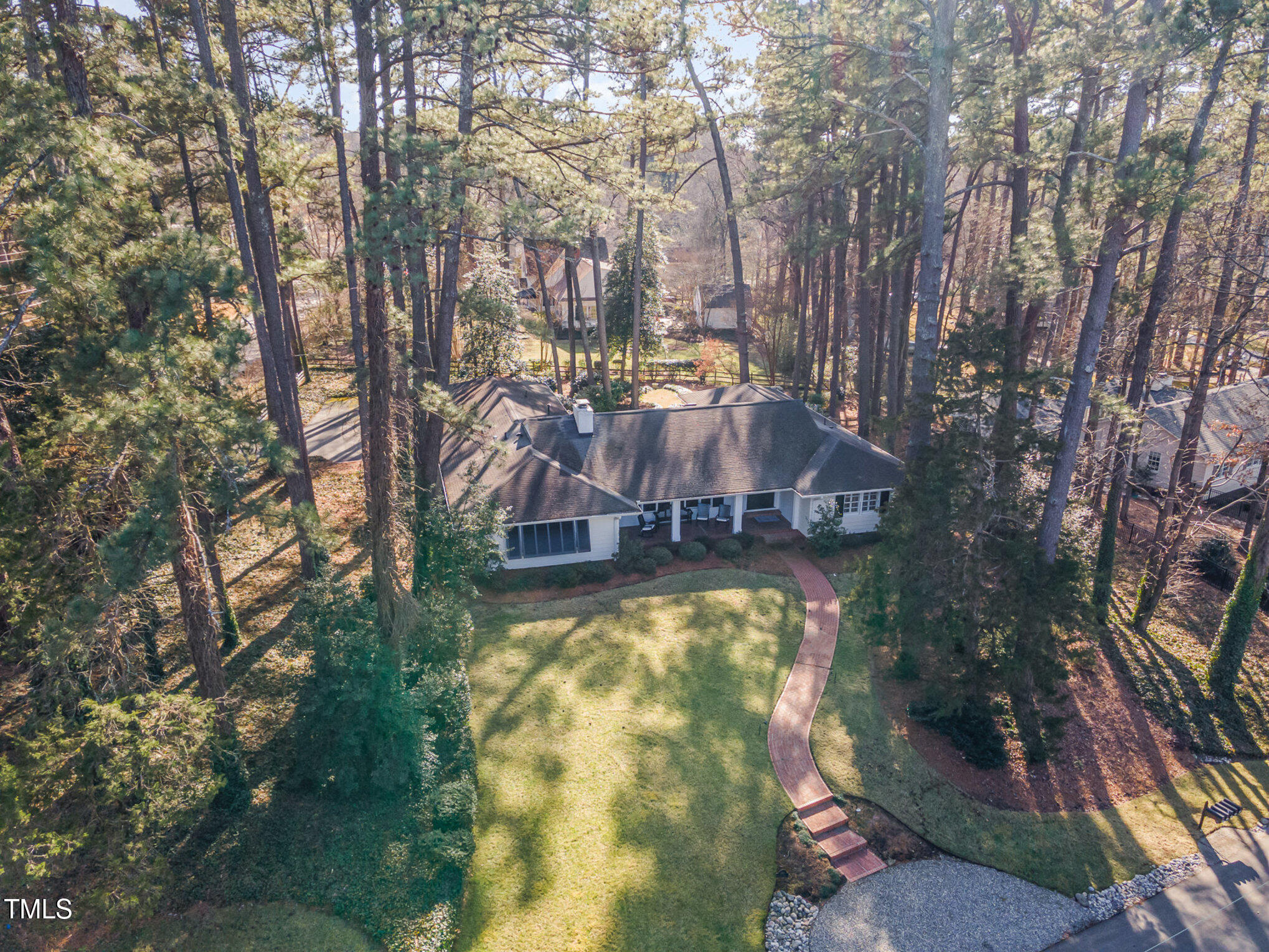 2801 Chelsea Circle Durham, NC 27707 - Photo 36 of 41 a view of a large house with large trees and a yard