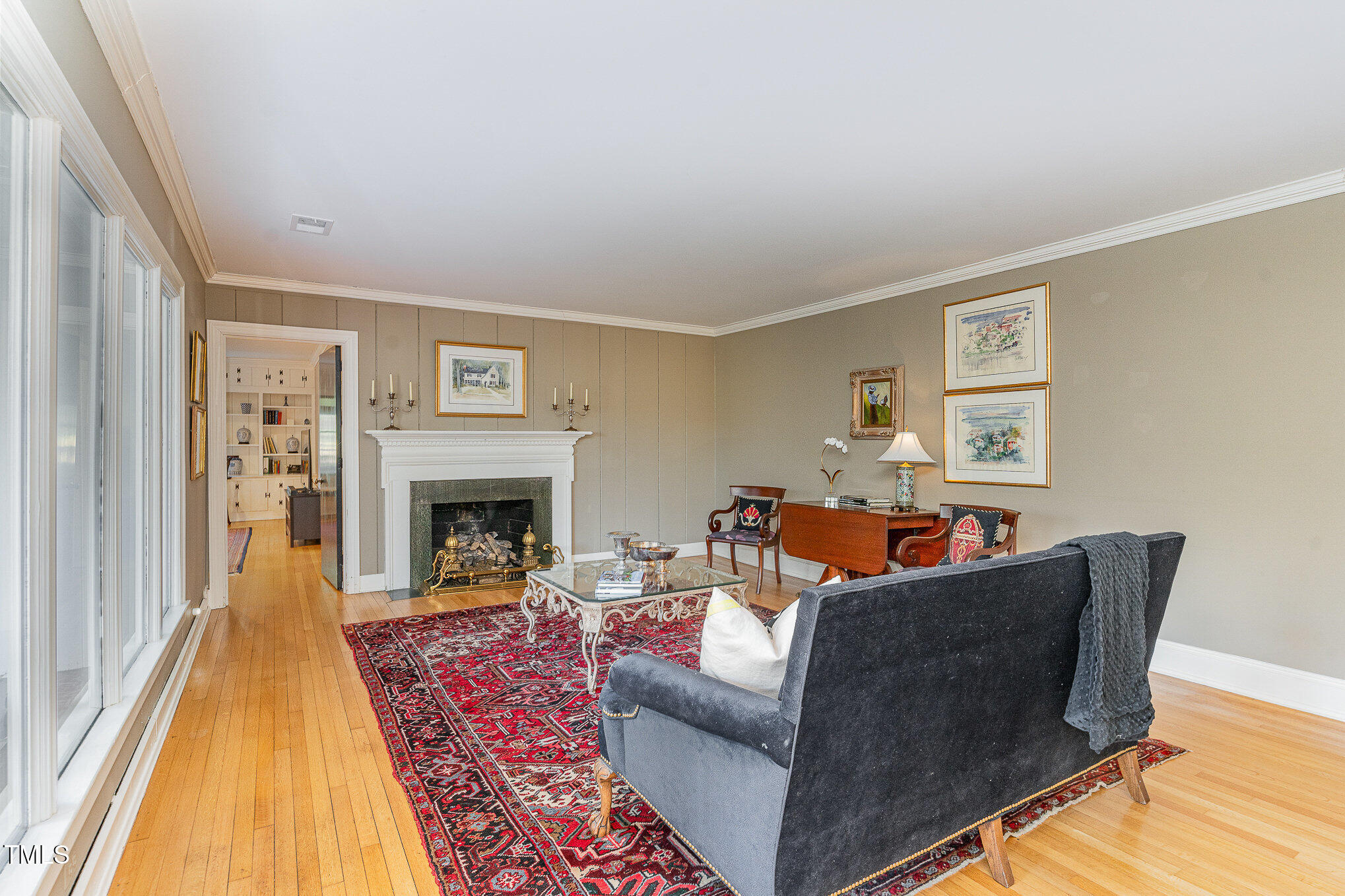 2801 Chelsea Circle Durham, NC 27707 - Photo 8 of 41 a living room with furniture and a fireplace