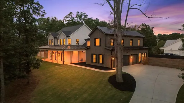 a view of a porch with furniture and floor to ceiling window