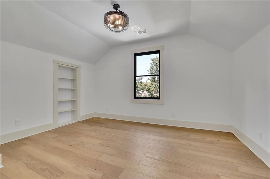 5525 Hubbard Town Road Cumming, GA 30028 - Photo 48 of 84 an empty room with a empty space and a window