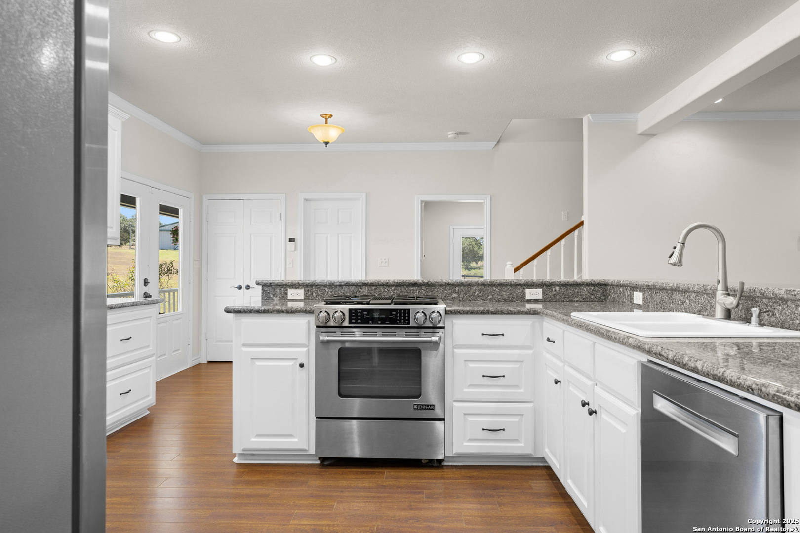 5450 Mazurek Road Schulenburg, TX 78956 - Photo 17 of 68 a kitchen with a stove oven and sink