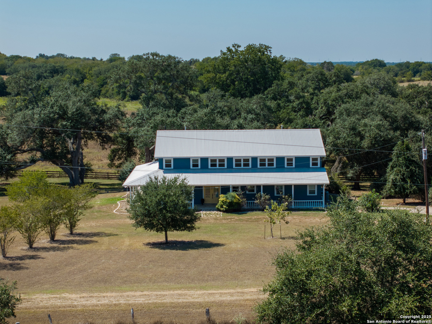 5450 Mazurek Road Schulenburg, TX 78956 - Photo 2 of 68 a view of a house with pool and sitting area