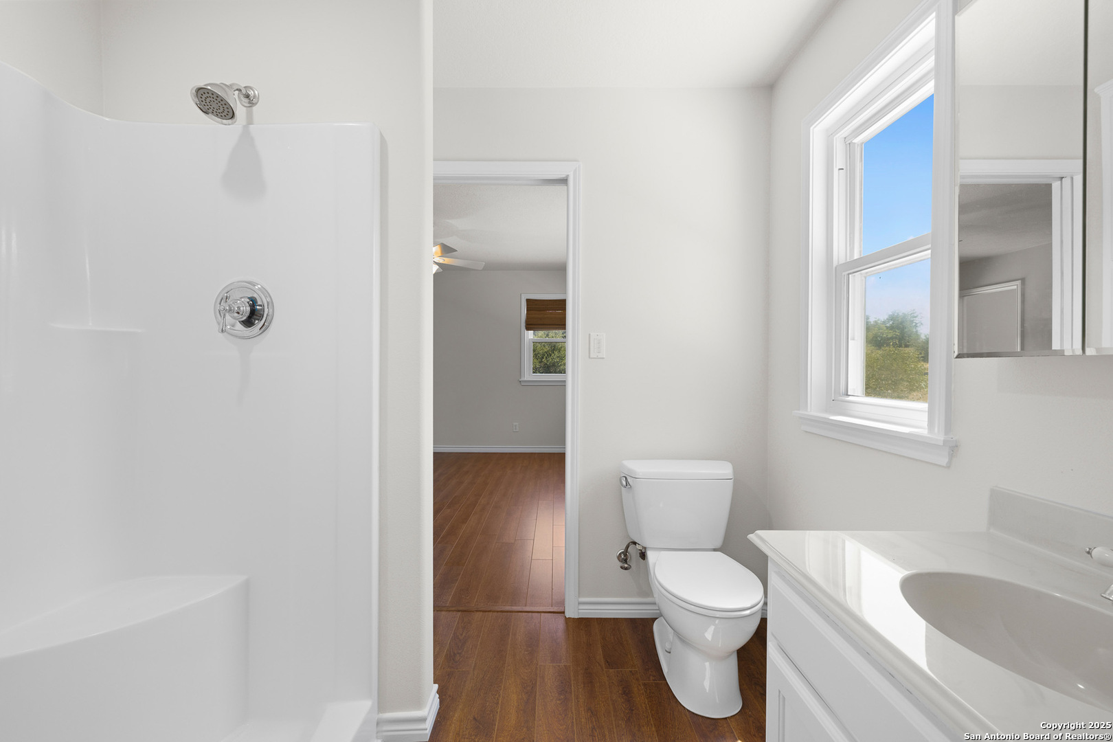 5450 Mazurek Road Schulenburg, TX 78956 - Photo 28 of 68 a white toilet sitting next to a bathroom sink