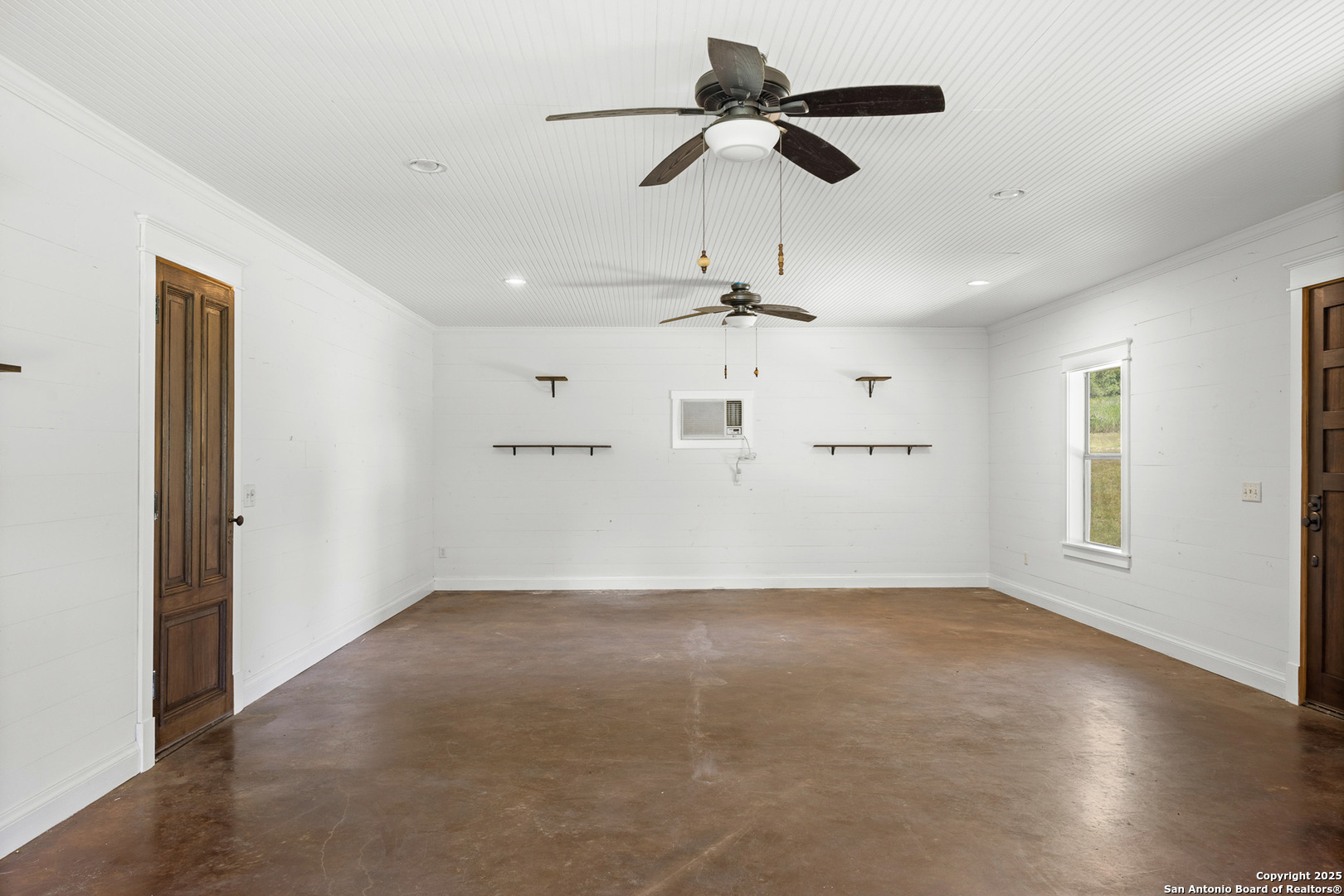 5450 Mazurek Road Schulenburg, TX 78956 - Photo 47 of 68 a view of an empty room with a window