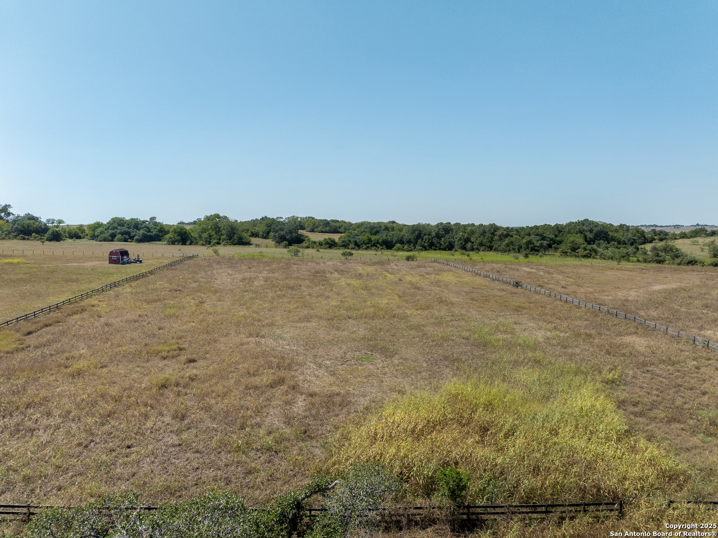 5450 Mazurek Road Schulenburg, TX 78956 - Photo 61 of 68 a view of a lake with houses in the background