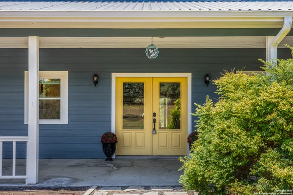 a view of park bench next to a lake