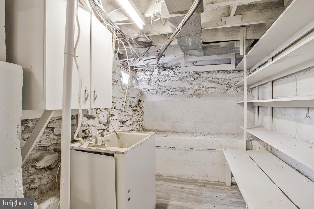 617 Annabel Avenue Baltimore, MD 21225 - Photo 34 of 40 a bathroom with a bathtub and shower