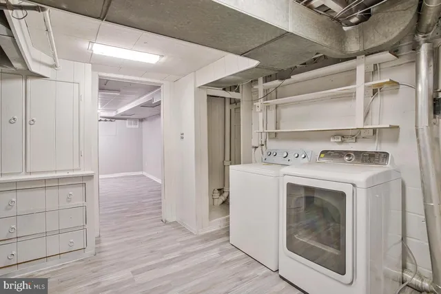 a utility room with dryer and washer