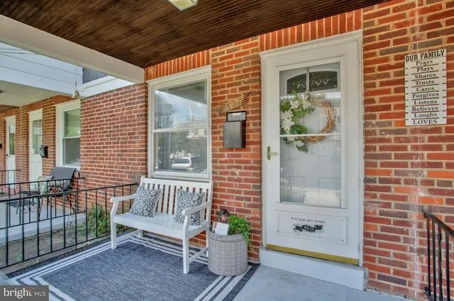 a view of a patio with a chairs and table in a patio