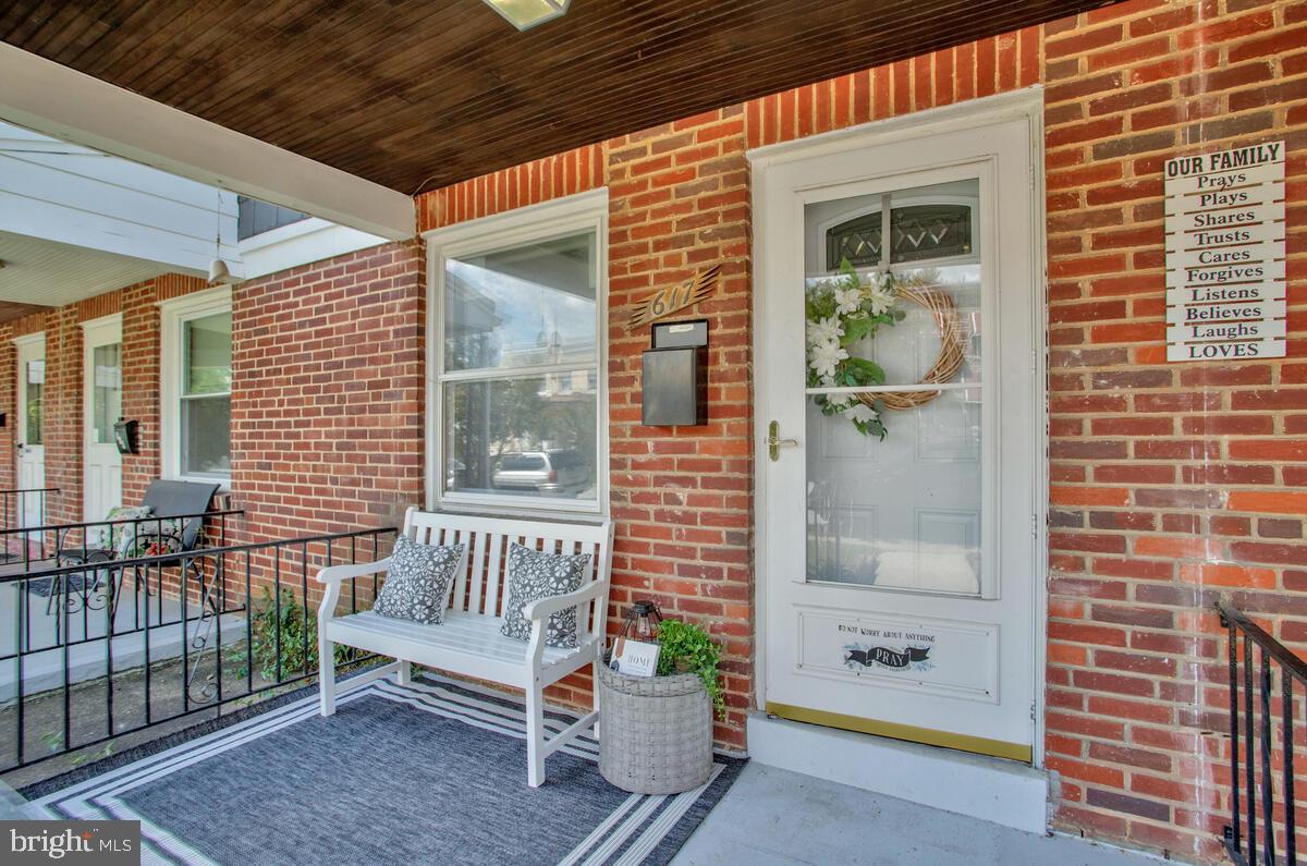 617 Annabel Avenue Baltimore, MD 21225 - Photo 4 of 40 a view of a patio with a chairs and table in a patio