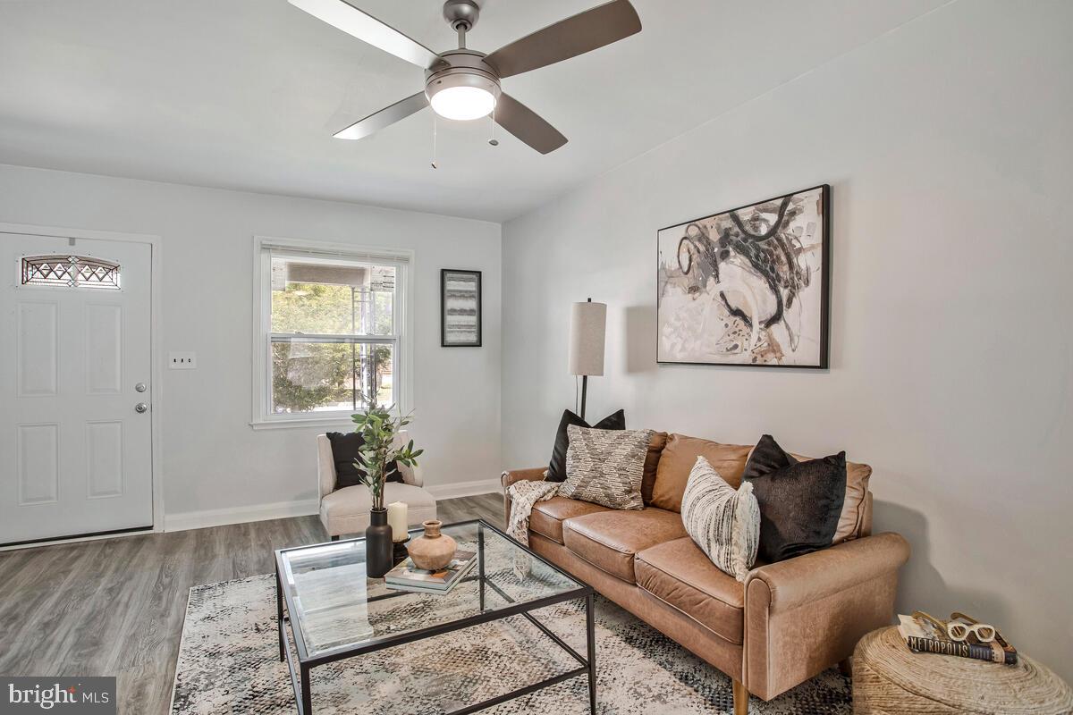 617 Annabel Avenue Baltimore, MD 21225 - Photo 10 of 40 a living room with furniture and a window