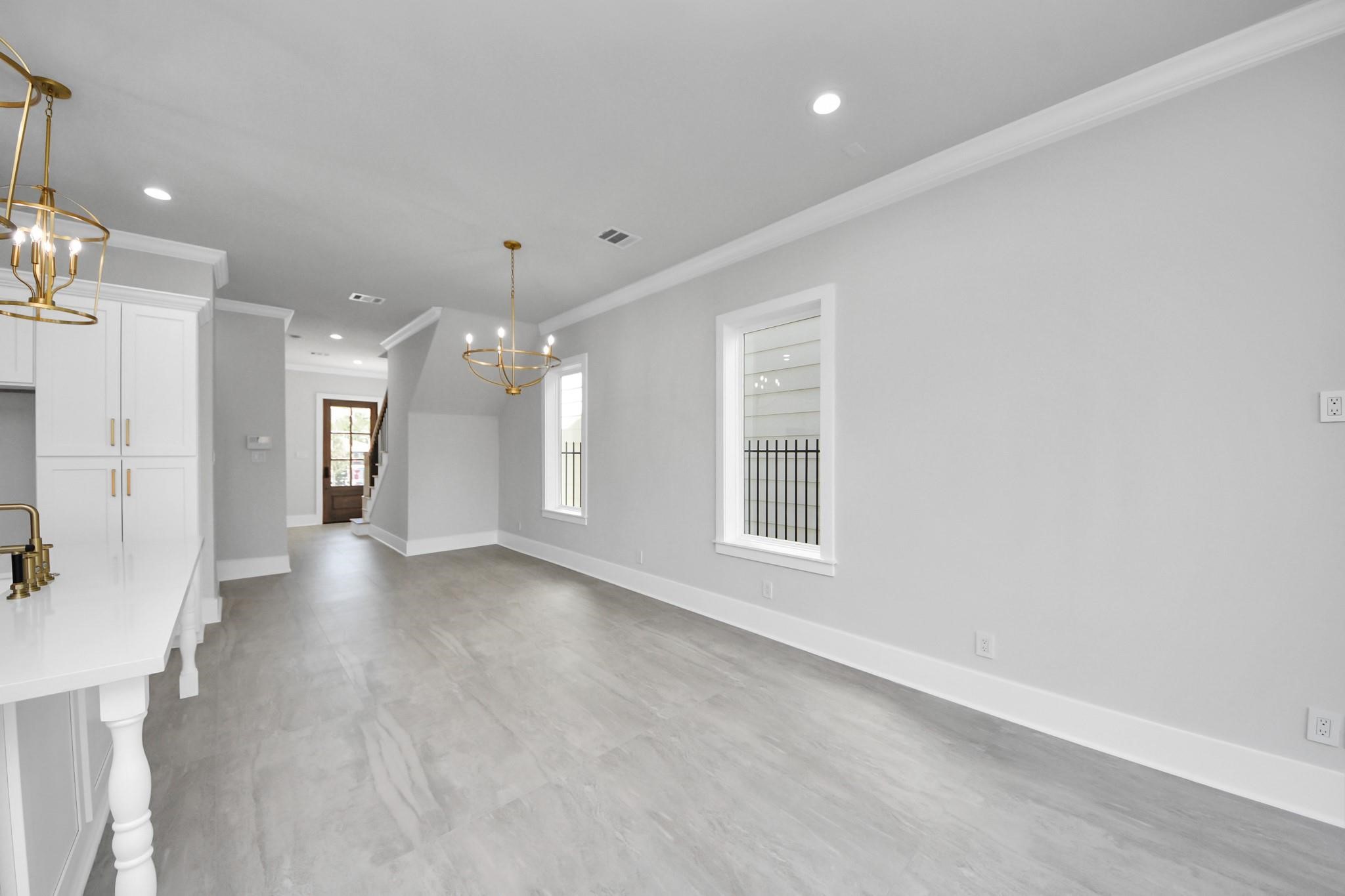 6320 Milwee Street, Unit B Houston, TX 77092 - Photo 8 of 30 a view of an empty room with a window