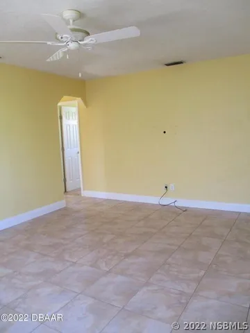 a view of a big room with carpet