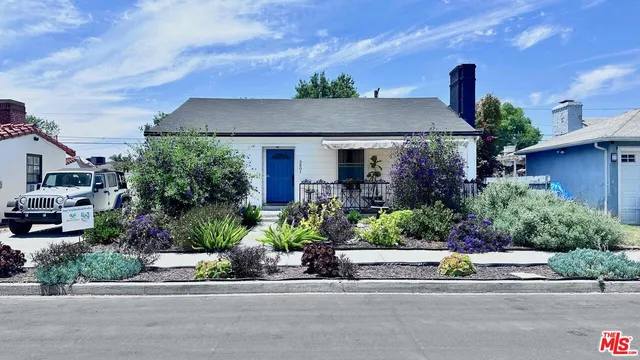 front view of a house with a street