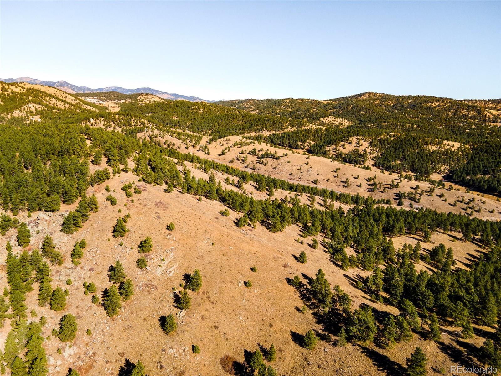 2345 Legacy Ranch Road Evergreen, CO 80439 - Photo 6 of 12 a view of city and mountains