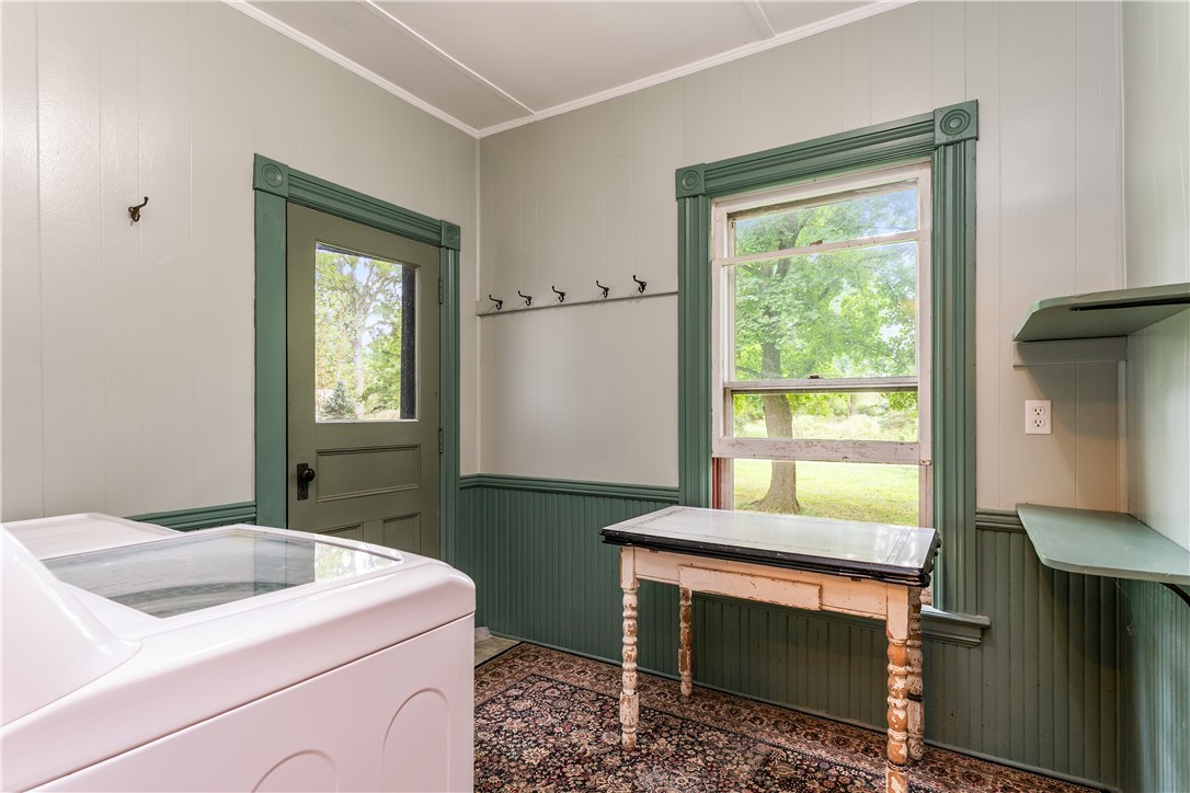 171 Works Road Rush, NY 14472 - Photo 22 of 49 First floor laundry, with a door to the back yard