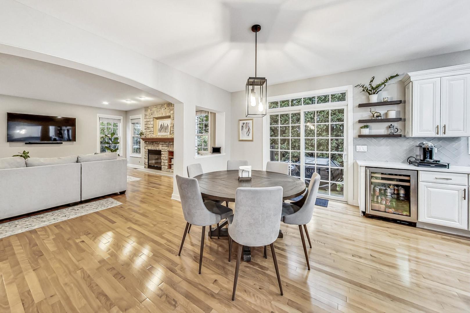 2680 Summit Drive Glenview, IL 60025 - Photo 18 of 70 a view of a dining room with furniture window and wooden floor