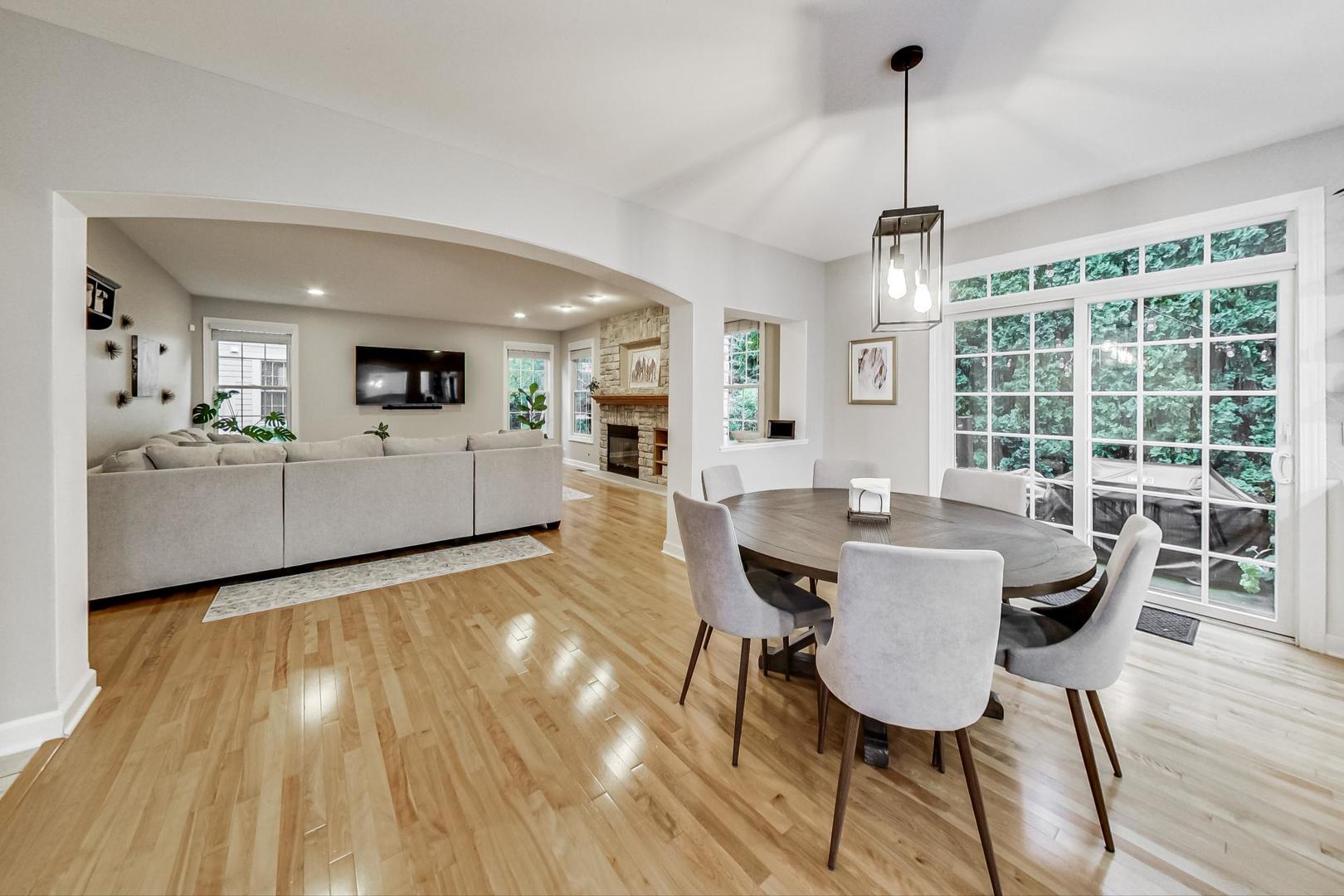2680 Summit Drive Glenview, IL 60025 - Photo 19 of 70 a view of a dining room with furniture window and wooden floor